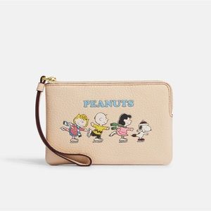 Coach X Peanuts Corner Zip Wristlet With Snoopy And Friends Motif!